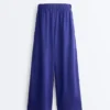 100% Linen Wide-Leg Trousers with Side Pleat 100% Linen Wide-Leg Trousers with Side Pleat