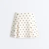 Short Piqué Skirt with Cotton Polka Dots Short Piqué Skirt with Cotton Polka Dots