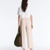 Wide-Leg Crop Trousers with Pleats and Stripes Wide-Leg Crop Trousers with Pleats and Stripes